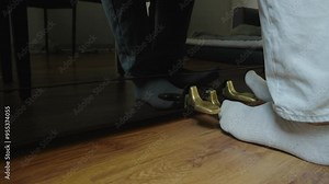 Close up pianist feet press the piano pedal. Musician studying to play the piano. Foot press piano pedal