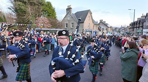 The Vale of Atholl Pipe Band march off through crowds playing Green Hills of Tyrol and When the Battle's o'er, during the 2025 Pitlochry New Year Street Party. The band were finishing their second display for this event and marched back through crowds into Fishers Hotel Pitlochry as they finished. This was on Wednesday 1st January 2025 and an annual event on New Year’s Day, held on Atholl Road by Fishers Hotel in Pitlochry. The event is led by compere Eddie Rose and includes displays by The Vale