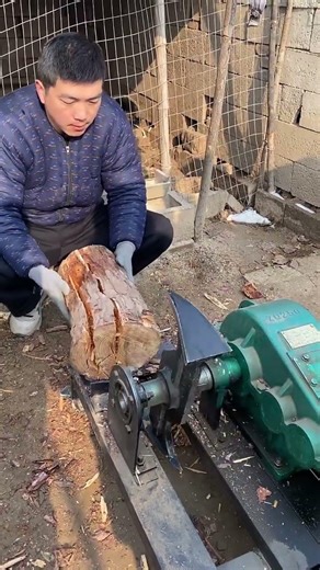 Chopping wood with a wood splitter saves time and effort. #woodchopping