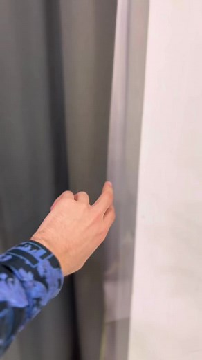 Stylish Outfit Try-Ons in a Trendy Fitting Room