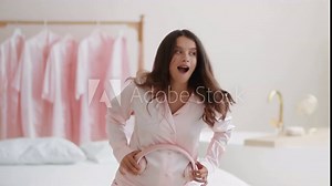 Prenatal baby development. Carefree pregnant woman putting headphones with music on big belly and dancing, free space