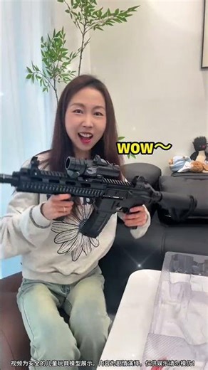 This guy is happy to be bought a toy gun😂