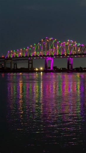 David NOLA on Instagram: "With Carnival colors glowing on the Crescent City Connection, the city eases into night. Good night, New Orleans. ✨🎭🌉"