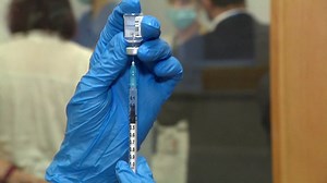 1st person in US to try COVID-19 vaccine talks side effects