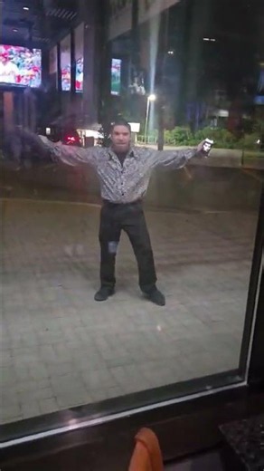 Jonny as Elvis leaving the building in Uber