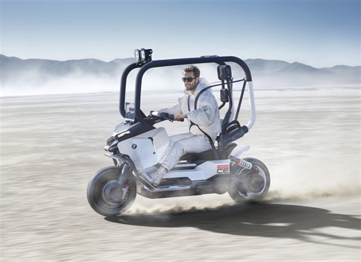 BMW unveils Vision CE: A self-balancing enclosed electric scooter designed for seatbelts over helmets