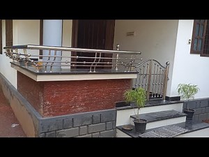 Charupadi kerala home sitout design work stainless steel. Sitout steel door