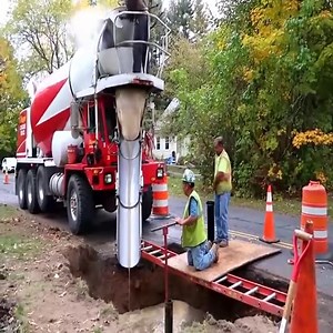 Two Concrete Trucks Fill a Trench for a Botched Water Main Valve Repair | Apple