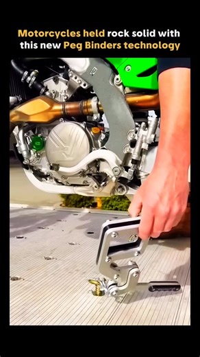 @future.explanation on Instagram: "Moto peg binders are a simple mechanical solution for motorcycle transport and storage. By securing the bike through the footpegs, they stabilize the frame without compressing the suspension or stressing delicate components. The system locks quickly, requires no front wheel chock, and distributes load more evenly during transit. This matters because reducing stress points helps prevent transport damage while speeding up loading and unloading, especially for tra