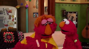 \"Sesame Street's Elmo gets the COVID vaccine\"