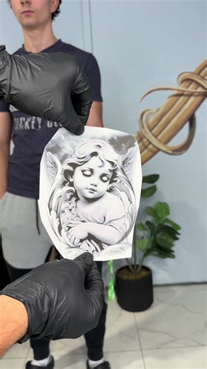 Angel tattoo done in black & grey realism. The cross tattoo above was done by another artist — always respect the art and the process. Huge thank you to Anthony for sitting like a rock throughout the session. Super happy with how this piece turned out. Based in Sudbury, Ontario — specializing in detailed black & grey realism tattoos. #RahulTattoo #SudburyTattoo #BlackAndGreyRealism #realismtattoo