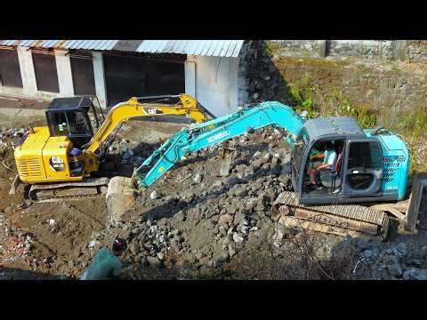 Mini Excavator Crew Blitzes Rock Wall for New Foundation