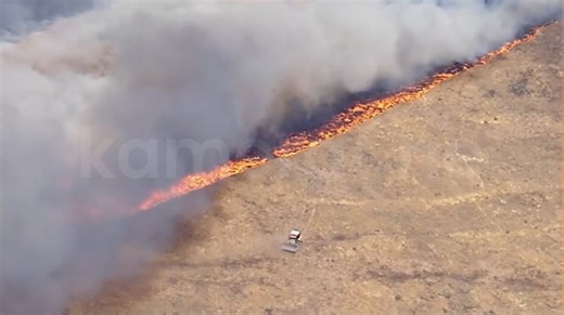 Bulldozer makes fire lines around Spring Fire