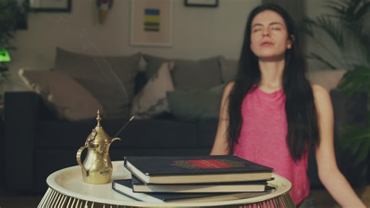 Girl meditating in her room with incense - Free Stock Video