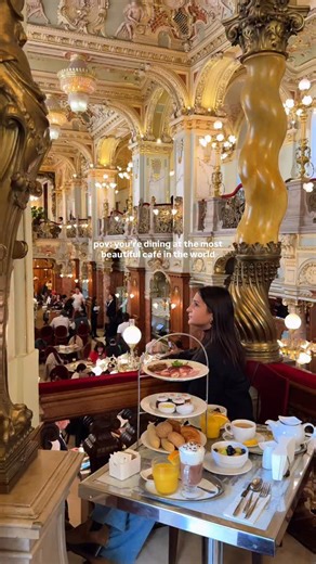This is the most beautiful café in the world ✨ The New York Café, Budapest - a golden palace of frescoed ceilings, marble columns and chandeliers straight out of a movie scene. Go around 3 PM for afternoon tea - no reservations needed, just a short wait (about 20–40 minutes). ☕️ What to try: • Afternoon Tea Set - sandwiches, cakes, bonbons, tea or coffee, and fresh juice • 24-Carat Gold Cappuccino - yes, it’s real gold • Apple Pie, Sacher Cake, Rákóczi Cottage Cheese Cake, or Chocolate Cake 💡 T