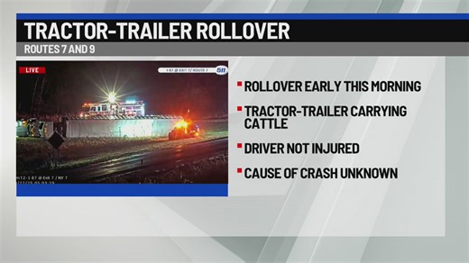 Cattle trailer rollover blocks left lane of ramp