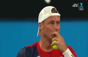 Tennis player shows his opponent the meaning of sportsmanship.