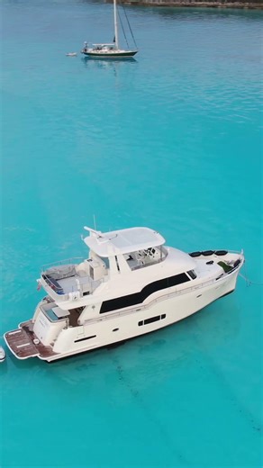 Step aboard SOUTH PAWS, a 2023 Outer Reef 62 Trident EVO designed to cruise in style and comfort!