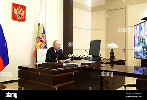 Novo-Ogaryovo, Russia. 29th Dec, 2022. Russian President Vladimir Putin attends the launch ceremony of the the nuclear-powered cruise missile submarine Imperator Aleksandr III via video link from the official residence at Novo-Ogaryovo, December 29, 2022 outside Moscow, Russia. The Russian Navy took delivery of the sixth Borei-class ballistic missile submarine and launched the seventh at the Sevmash shipyard in Severodvinsk. Credit: Mikhail Klimentyev/Kremlin Pool/Alamy Live News Stock Photo - A