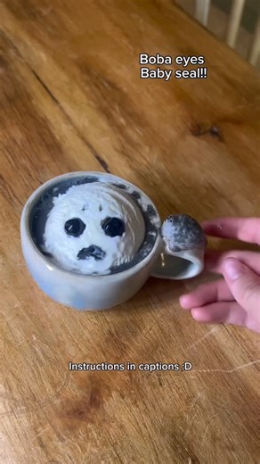 Studio Barghest on Instagram: "Instructions below:⬇️ 🦭💨 1: Make boba in saucepan. I used 5 minute tapioca pearls, otherwise they take ages. I covered most of these in taro syrup, but left some for decoration later. Set them aside. 3: clean saucepan…. 2: Make taro milk tea in clean saucepan. using taro syrup, tea bags and milk. Next, I squirted in some blue food dye to make it go grey (colour theory??), for the classic grey colour of a seal drink. 😋YUM 3: Add syrupy boba and tea in mug. 4: Sco