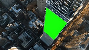 clip-3576359245-3d-greenscreen-banner-tracked-on-high-rise-wall