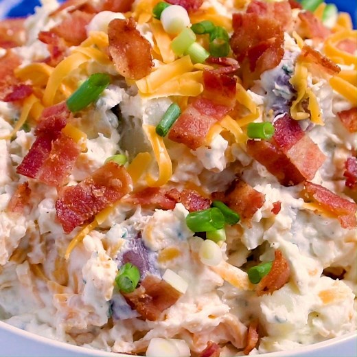 Loaded Ranch Potato Salad is super creamy with tons of flavor from a packet of Ranch seasoning, cheddar cheese, and bacon. Recipe: https://spicysouthernkitchen.com/loaded-ranch-potato-salad/ | Spicy Southern Kitchen