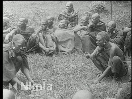 Shot in 1919, this rare film invites us into a Kikuyu council meeting. Elders sit in a circle wrapped in blankets while two younger men slide thin sticks across the grass probably some arithmetic? The sticks probably serve as a public ledger, helping everyone track livestock, bridewealth, or tax shares in real time. It is a brief but vivid glimpse of grassroots governance and everyday mathematics in Central Kenya before colonial rule reshaped local authority. Watch how each bundle of sticks draw