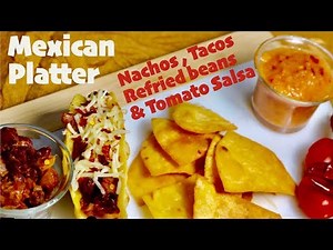 Mexican Platter | Nachos and Tacos served with Refried beans and Tomato Salsa