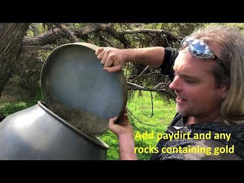 Gold extraction using an improvised cement mixer as a ball mill.