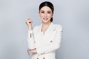 Miss Universe Myanmar contestant holds 'Pray for Myanmar' sign
