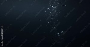 4K underwater illuminated bubbles motion. Ocean floor bubbles. Real underwater footage. Deep under sea level. Floating plankton. Marine background VFX element. Underwater bubbles mayhem