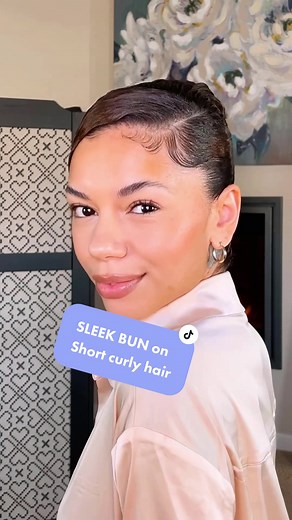 Sleek High Side Bun for Short Curly Hair