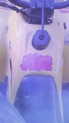 Exploring a Worn Yellow All-Terrain Vehicle (ATV)