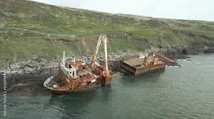 MV Alta Shipwreck Break In Half Lies In The Ballycotton Rocky Coast In Ireland. - aerial