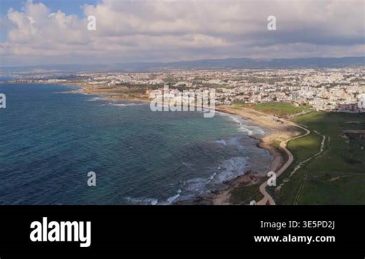 Aerial drone view of coastline and city buildings along the Mediterranean Sea in Paphos, Cyprus Stock Video Footage - Alamy