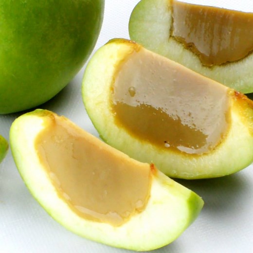 Caramel Apple Jello Shots - make a special Halloween treat or fun dessert using apples and melted caramel. PRINT OR PIN THE RECIPE: http://omgchocolatedesserts.com/caramel-apple-jello-shots/ | OMG Chocolate Desserts