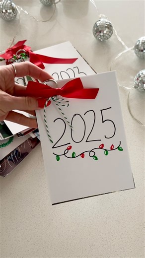 1.5K views · 33 reactions | Christmas cards are one of our favorite things and I always felt bad throwing them away each year… so a few years ago, we stopped! Instead we make a little “year book” with the cards. My kids love looking through them each year at Christmas time. I store them with our Christmas books so they are easy to find. If you think this idea is great, I’d love for you to hit the reshare button 﫶❤️ | Q's Hairdos | Facebook