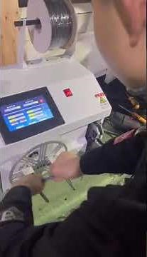 Wire cable winding machine.