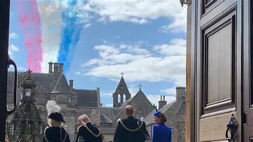 King Charles animated as Red Arrow flypast soars over his head