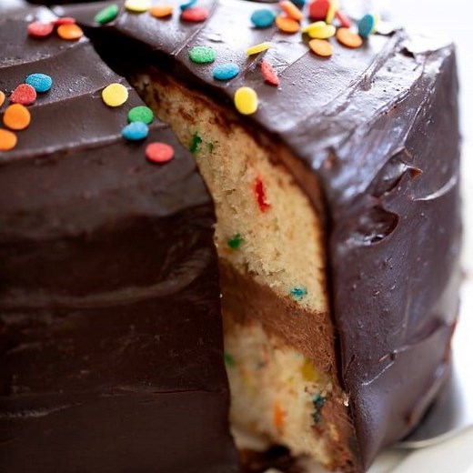 This classic gluten free birthday 🎈cake is a Funfetti-style vanilla layer cake filled with chocolate sour cream frosting and topped with chocolate icing. It's my go-to birthday cake. Make it yours! | Gluten Free on a Shoestring