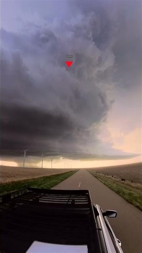 Supercell with a prominent elevated mesocyclone just north of Perryton, TX with some cool structure.