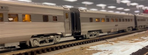 An ancient Santa Fe 2-10-10-2 is seeming pulling a modernized streamlined passenger train. | Charleston Area Model Railroad Club
