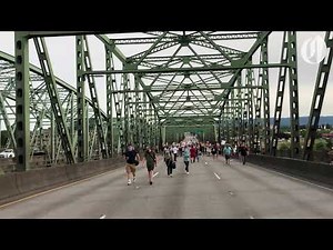 Protesters march across Interstate Bridge