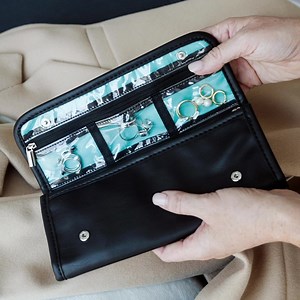 This exclusive jewelry roll holds all of your meaningful Origami Owl styles for when you need your jewelry on-the-go! It's only $25 this month only when you spend $50 on our site. What do you think? Isn't it so cute (and practical!)? | Origami Owl