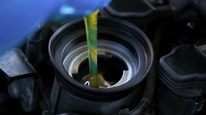Pouring Machine Oil Into Engine Car Stock Footage Video (100% Royalty-free) 1057813348 | Shutterstock