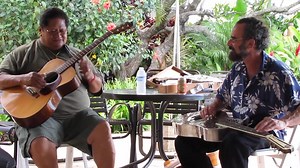 🌊🎸 Ledward Kaapana with Bob Brozman — “Moana Chimes” (Napili Bay, 2011) A steel‑and‑slack key summit on the beach in Maui. Filmed at George Kahumoku Jr.’s slack key workshop at Napili Bay in June 2011, Ledward Kaapana holds down the groove on six‑string kī hōʻalu while Bob Brozman sings over the top on acoustic steel. The tempo is relaxed, the time is deep, and the two of them trade ideas so naturally it feels like one long conversation rather than a “feature” solo. “Moana Chimes” is a classic