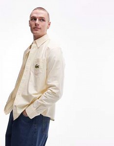 Lacoste - Chemise à rayures verticales et manches longues - Jaune/blanc | ASOS
