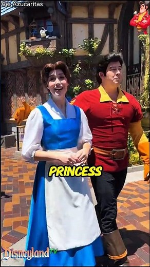 Gaston & Belle shares a wonderful experience with a guest.#gaston #belle #disneyland