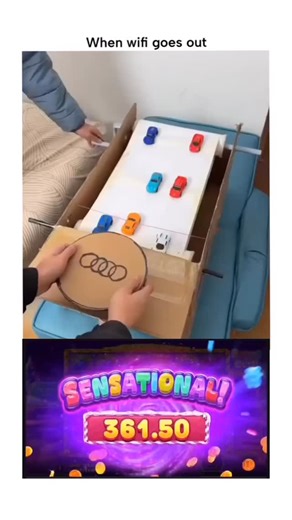 SP on Instagram: "🏎️ The Cardboard Grand Prix: An Analog Resilience Study This media depicts a masterfully crafted, fully functional miniature car race track, constructed almost entirely from repurposed cardboard, dowel rods, and string. The DIY gravity-fed system, complete with a manual launch lever and a rotating cardboard Audi logo for track control, provides a compelling alternative to digital entertainment “When wifi goes out.” Four miniature die-cast cars—red, blue, yellow, and green—are 