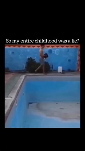 Good Videos For You! 🎥 on Instagram: "​The video starts with a man holding a black and white cat near the edge of an empty, dirty swimming pool. There is a text overlay at the top that reads, "So my entire childhood was a lie?" accompanied by a cartoon crocodile emoji that opens its mouth as the video progresses. The man suddenly drops the cat into the pool, which is mostly drained but has a layer of murky water at the bottom. As the cat falls, a high-pitched, comical scream sound effect is pla